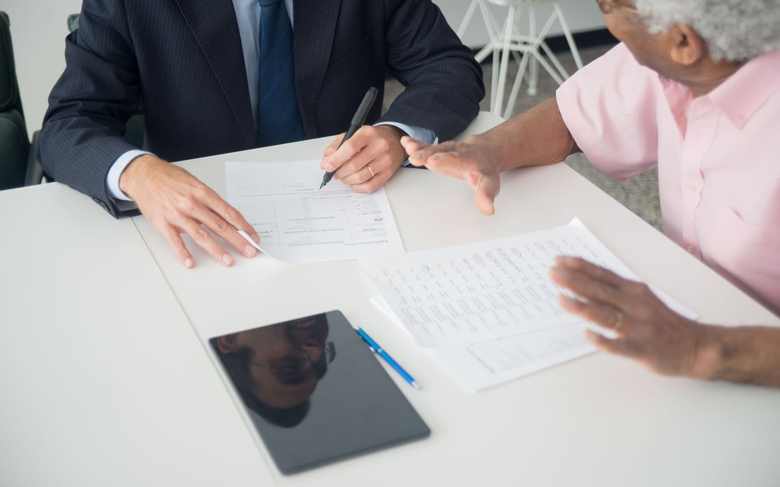 Insurance consultation at an office desk