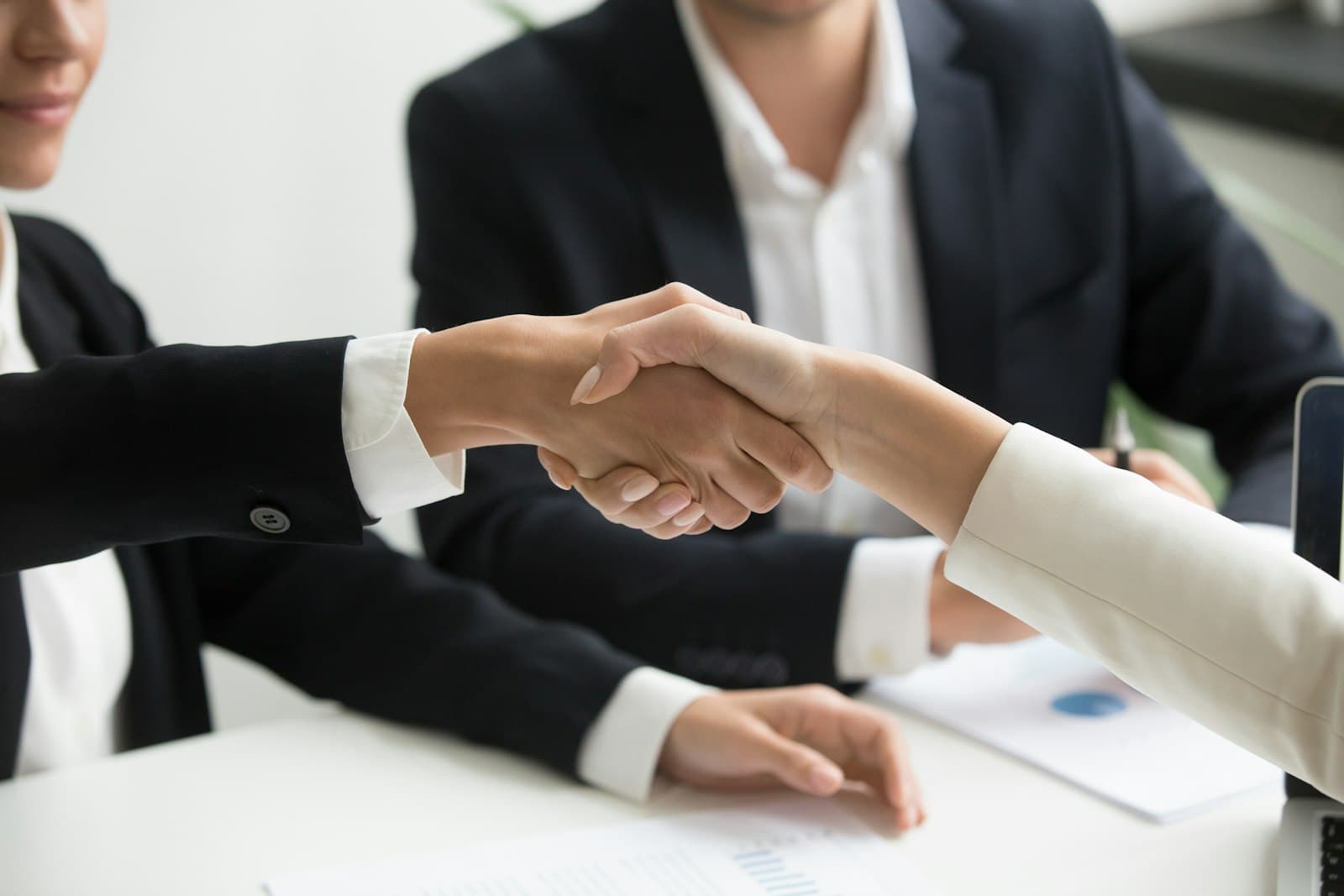 dealers and distributors database India — Business handshake representing a new company or vendor connection